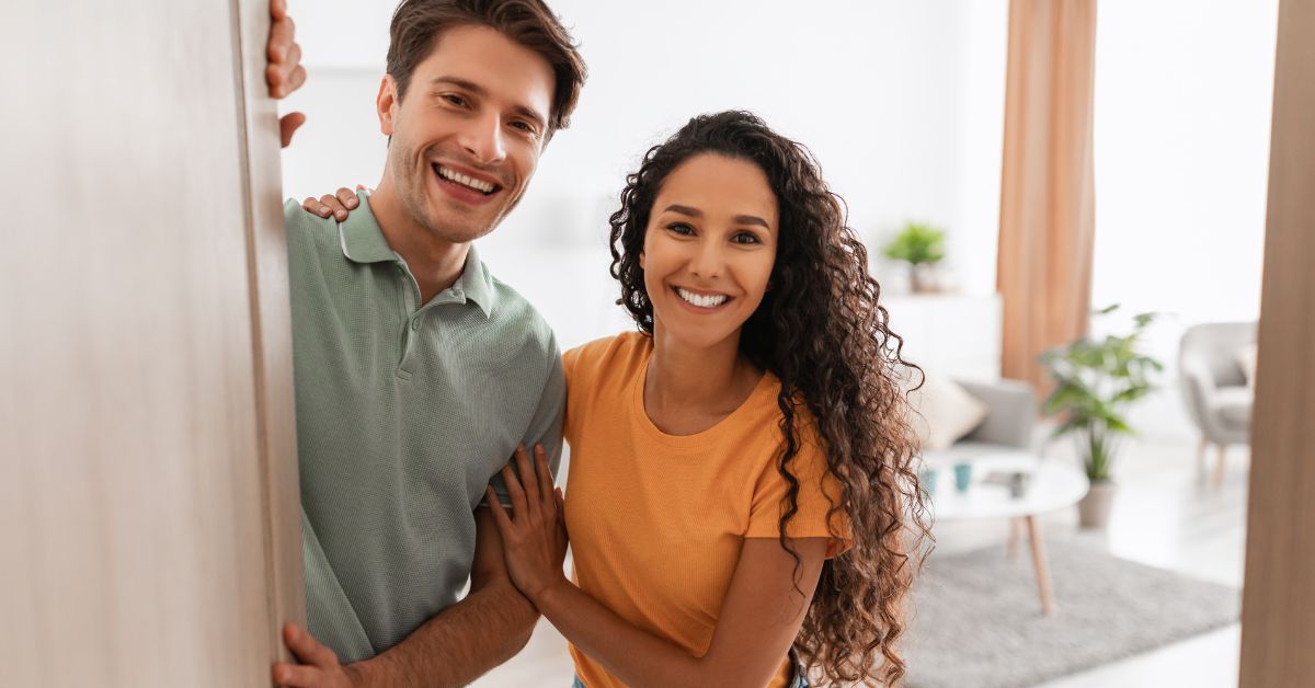 Happy couple in a common law marriage at their home.